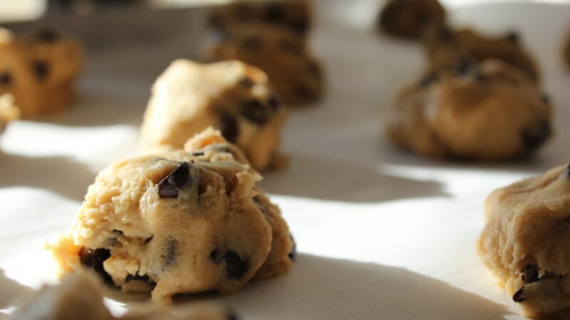 round chocolate cookies on white surface