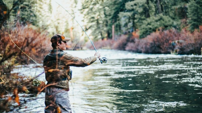 man fishing during daytime